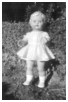 Esther gav Birgit denne dukke i dåbsgave og syet Birgit en kjole ligesom dukkens.1958