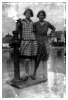 Helga og Grethe Puge ved landsbyposten og gadekæret i Gundslev.1930.